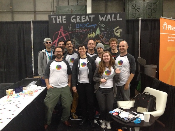 Kalamuna team in front of the wall