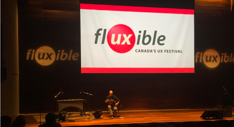 &nbsp;Ben Grossman plays the hurdy-gurdy between speakers at Fluxible