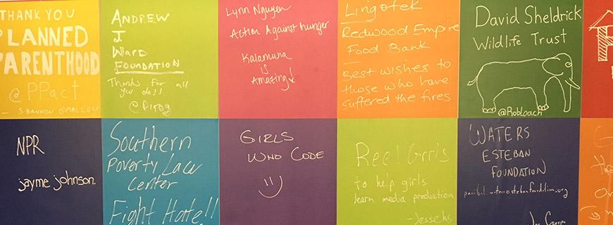 Stickers displaying hand-written messages to nonprofit organizations.